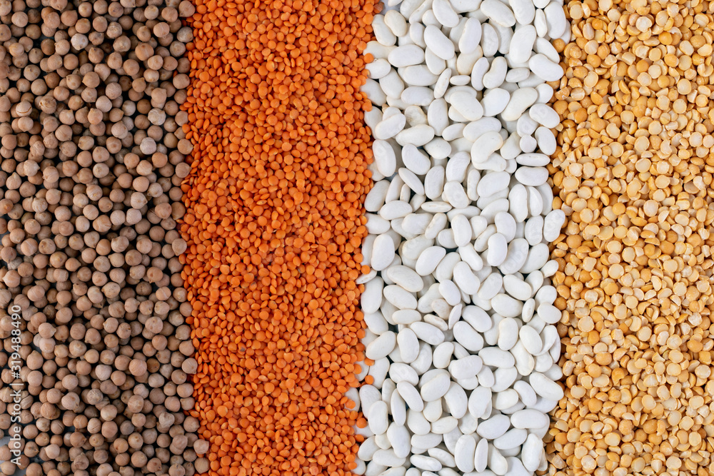 lines of various legumes red lentils, black lentils, yellow lentils, red beans, green mung beans background lines of various legumes red lentils, black lentils, yellow lentils, red beans, green mung beans background