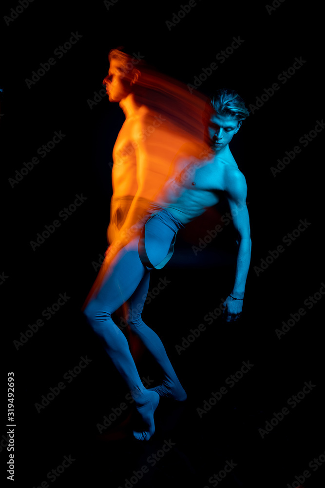 Dancing Double portrait of falling handsome torso naked man.  Blue and orange. dancer choreographer allegorical metaphorical representation emotions and feelings