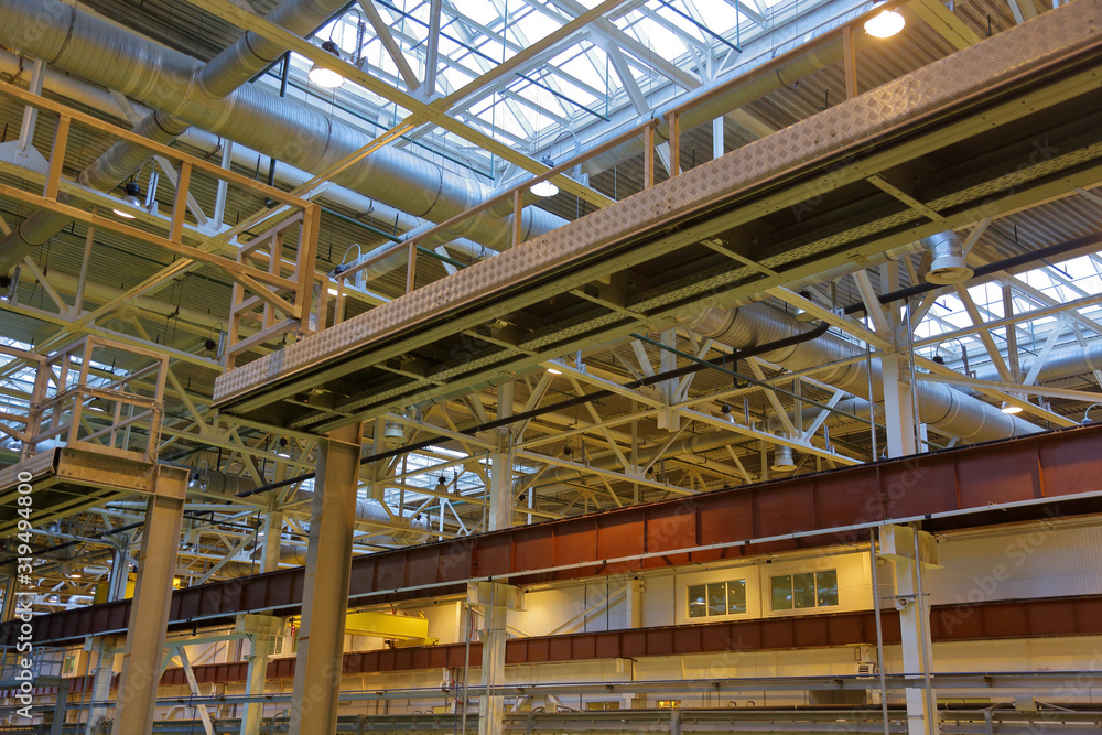 The combination of the steel beams and metal pipes in the industrial premise of the plant