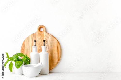 Kitchen background, front view kitchen utensils on white countertop