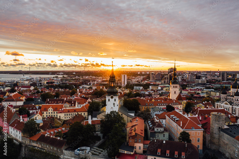 Talinn, Estonia. Old town city aerial drone view during sunrise.