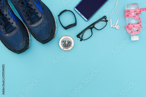 fitness stuffs against aqua background. health care conceptual images. flat lay. copy space