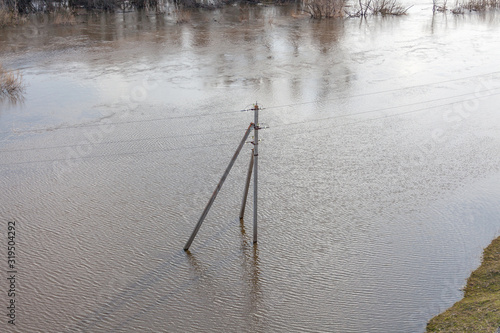 spring flooding in the Russian village. Typical phenomenon during the spring season in Russia. © Tatiana