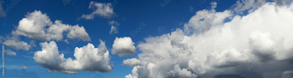 Wide Angle Landscape With blue sky with clouds and sun.