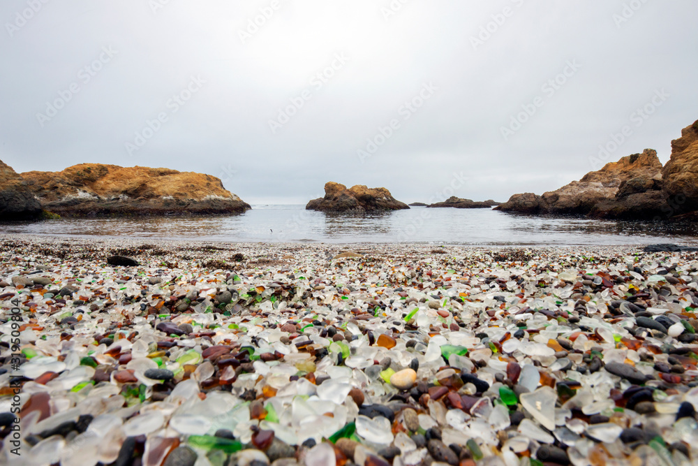 © Tandem Stock - A view of Glass Beach in Fort Bragg, California. Glass Beach is a beach in MacKerricher State Park that is abundant in smooth sea glass created from years of dumping garbage into an area of coastline near the northern part of the town. © Tandem Stock - A view of Glass Beach in Fort Bragg, California. Glass Beach is a beach in MacKerricher State Park that is abundant in smooth sea glass created from years of dumping garbage into an area of coastline near the northern part of the town.