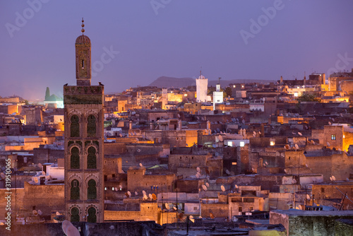 Looking out over the old city of Fes el-Bali at night in Fes, Morocco.