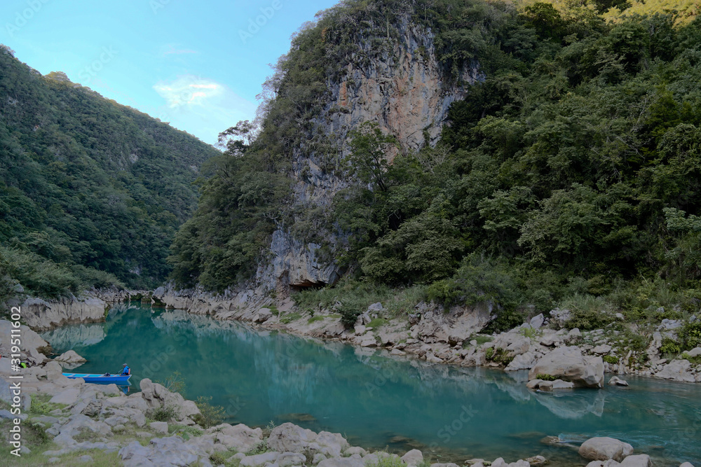 River and amazing crystalline blue water of Tamul waterfall in San Luis Potosí, Mexico River and amazing crystalline blue water of Tamul waterfall in San Luis Potosí, Mexico