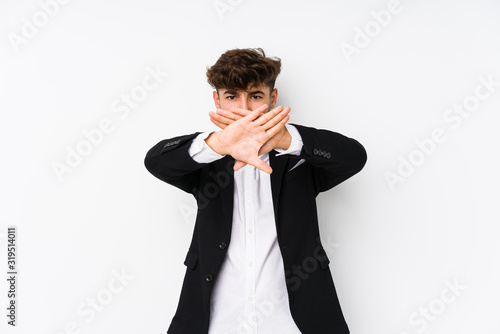 Young arabian business man isolated doing a denial gesture