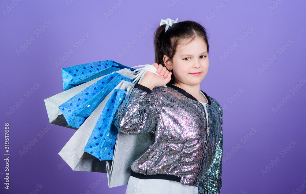 Online store. Happy child. Little girl with gifts. special offer. Holiday purchase saving. Sales and discounts. Kid fashion. shop assistant with package. Small girl with shopping bags in online store Online store. Happy child. Little girl with gifts. special offer. Holiday purchase saving. Sales and discounts. Kid fashion. shop assistant with package. Small girl with shopping bags in online store