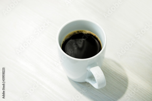 black coffee americano in clean white mug on white background. clean and fresh picture