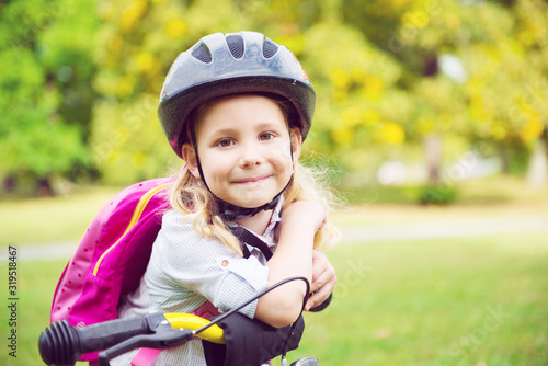 Pretty little girl ride with bicycle
