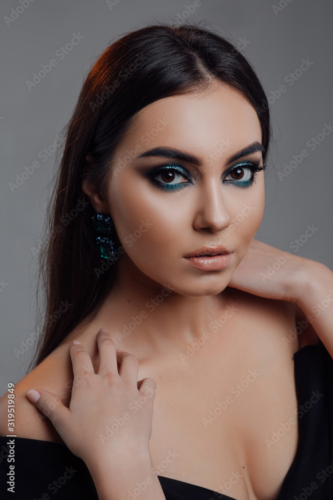 High Fashion model woman posing in studio. Portrait of beautiful sexy girl with trendy make-up. Beautiful young female brunette model. Fashion, beauty, cosmetics, beauty salon, manicure on nails, styl High Fashion model woman posing in studio. Portrait of beautiful sexy girl with trendy make-up. Beautiful young female brunette model. Fashion, beauty, cosmetics, beauty salon, manicure on nails, styl