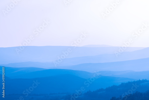 Tela blue ridge mountains in crimea on sunset background