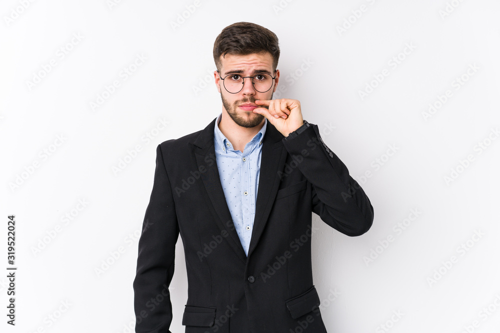 Young caucasian business man posing in a white background isolated Young caucasian business man with fingers on lips keeping a secret. Young caucasian business man posing in a white background isolated Young caucasian business man with fingers on lips keeping a secret.