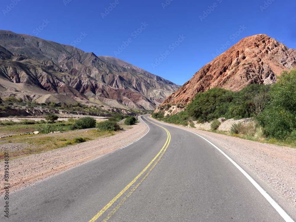 Quebrada de Humahuaca. The Hill of the Seven Colours shows its colourful face. The name of the town can be interpreted as the combination of Aymara language words purma (desert) and marca(city) Quebrada de Humahuaca. The Hill of the Seven Colours shows its colourful face. The name of the town can be interpreted as the combination of Aymara language words purma (desert) and marca(city)