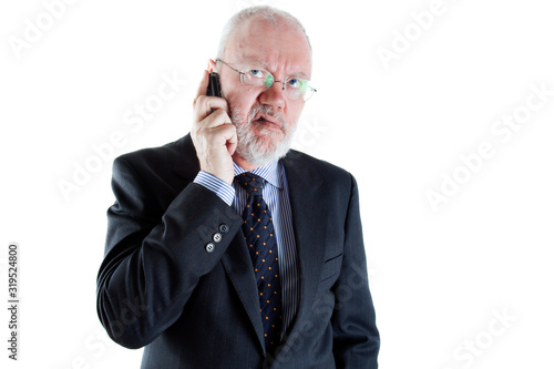 Senior elderly man as Lawyer Director Teacher or Salesman is feeling disappointed with phone call on white background