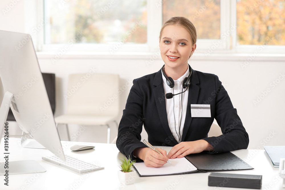 Female secretary working in office Female secretary working in office