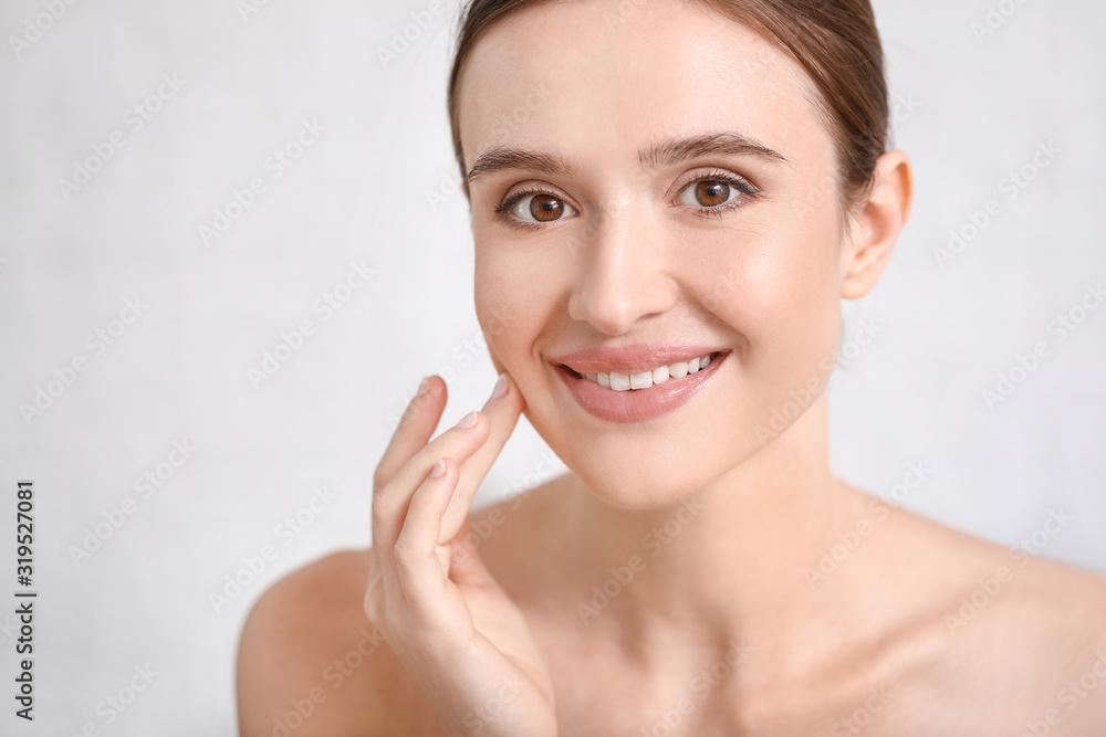 Beautiful young woman with healthy skin at home Beautiful young woman with healthy skin at home