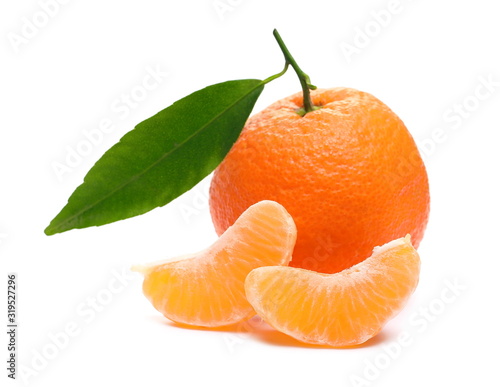 Tangerine with pieces isolated on white background