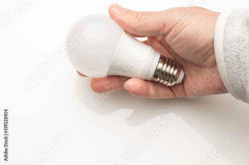 Energy saving light bulb and white color, daylight.