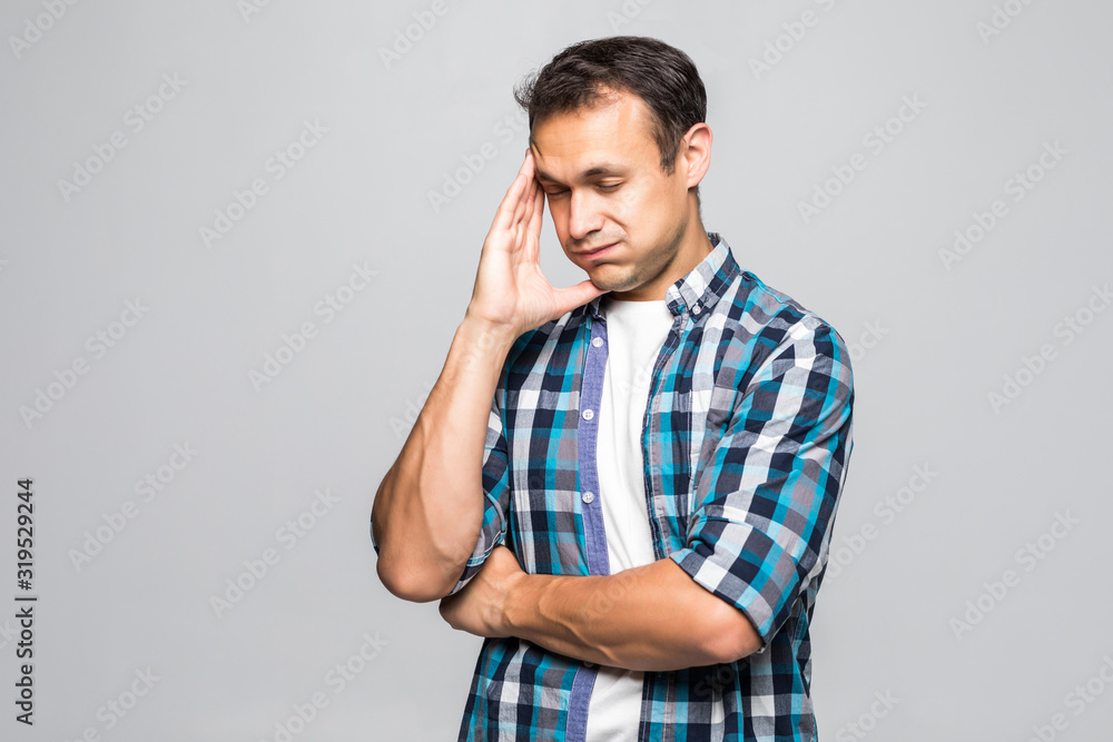 Young handsome young man thinking isolated on white background Young handsome young man thinking isolated on white background