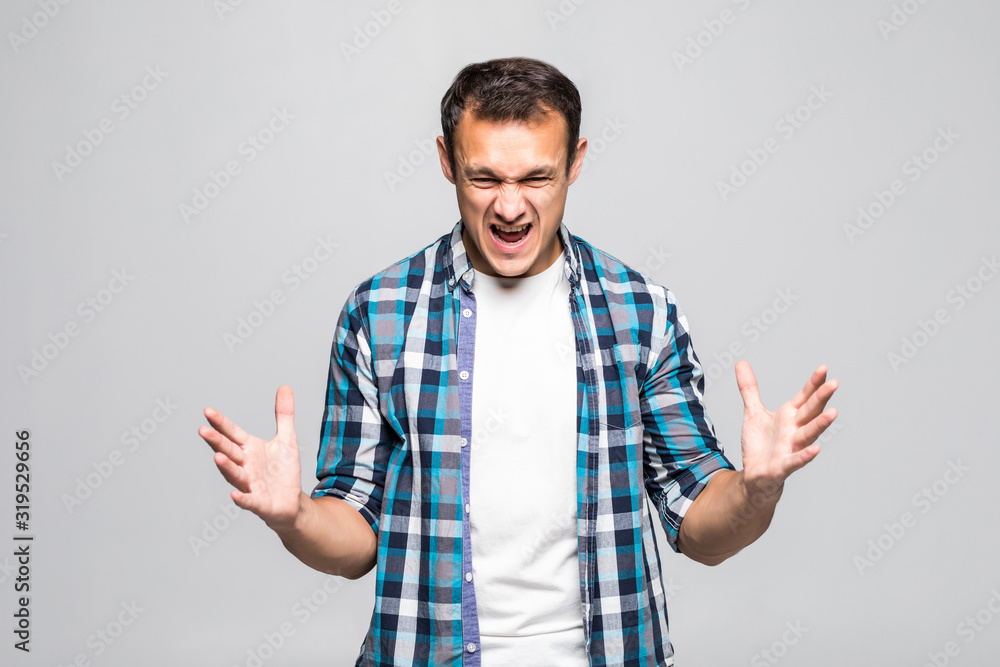 Young man with nervous crisis isolated on white background Young man with nervous crisis isolated on white background
