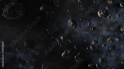 Asteroids fly in space against the background of stars