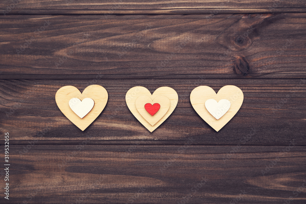 Colorful hearts on wooden table Colorful hearts on wooden table