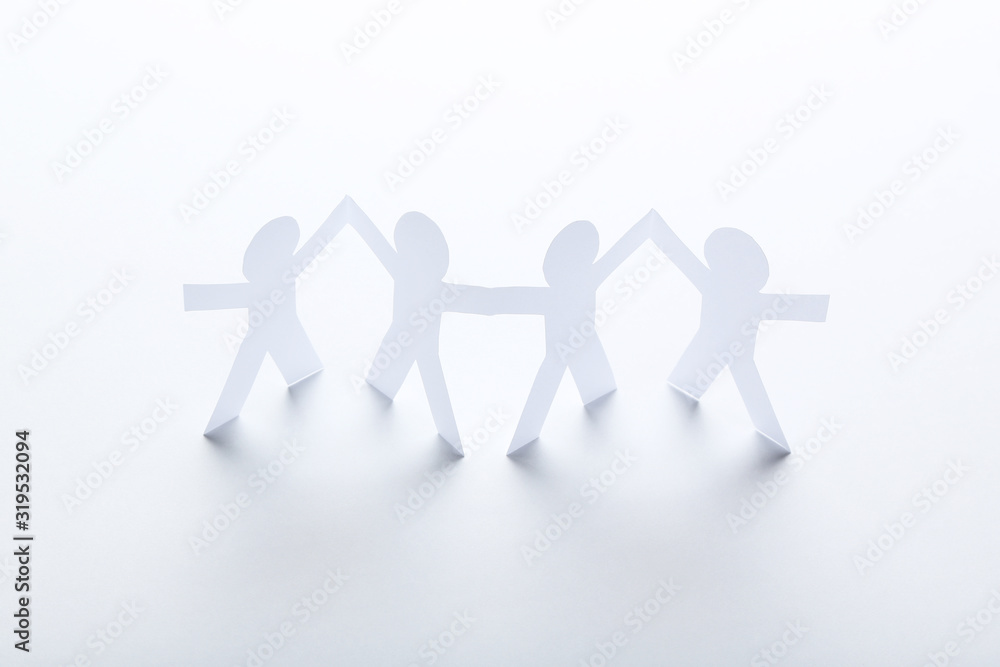 Paper chain people on white background Paper chain people on white background