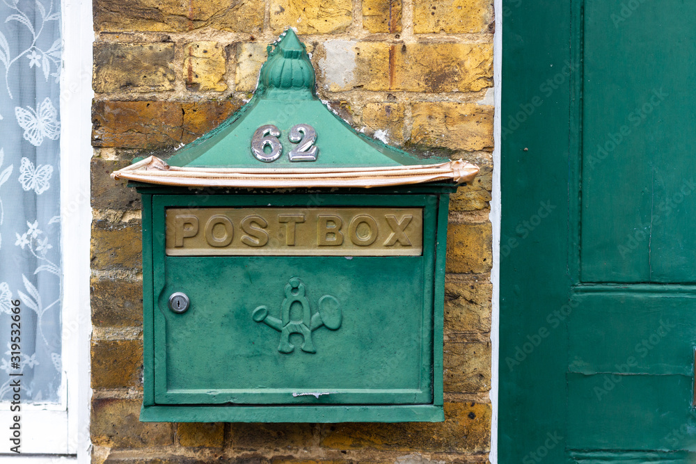 Traditional green postbox in Britain