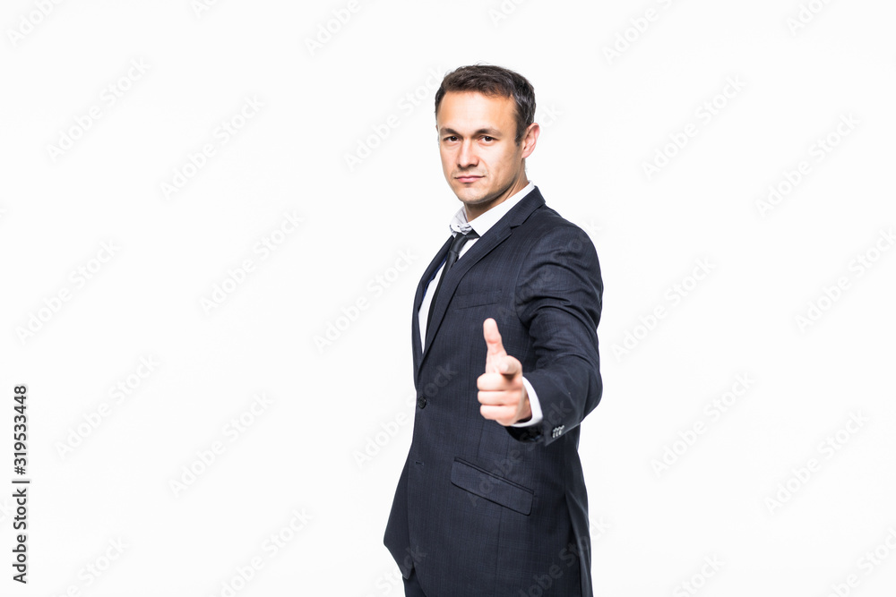 Portrait of young man pointing with his finger isolated on white background Portrait of young man pointing with his finger isolated on white background
