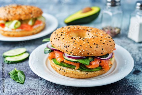 Tableau sur toile Smoked salmon ricotta cheese cucumber bagel