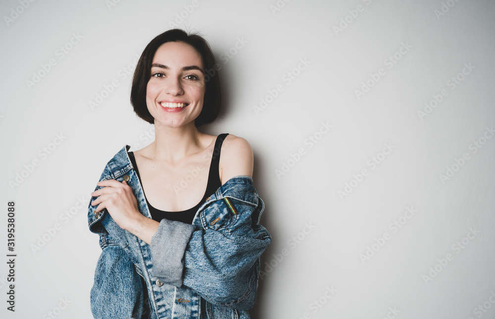 Beautiful girl smiles broadly at the camera. Beautiful girl smiles broadly at the camera.
