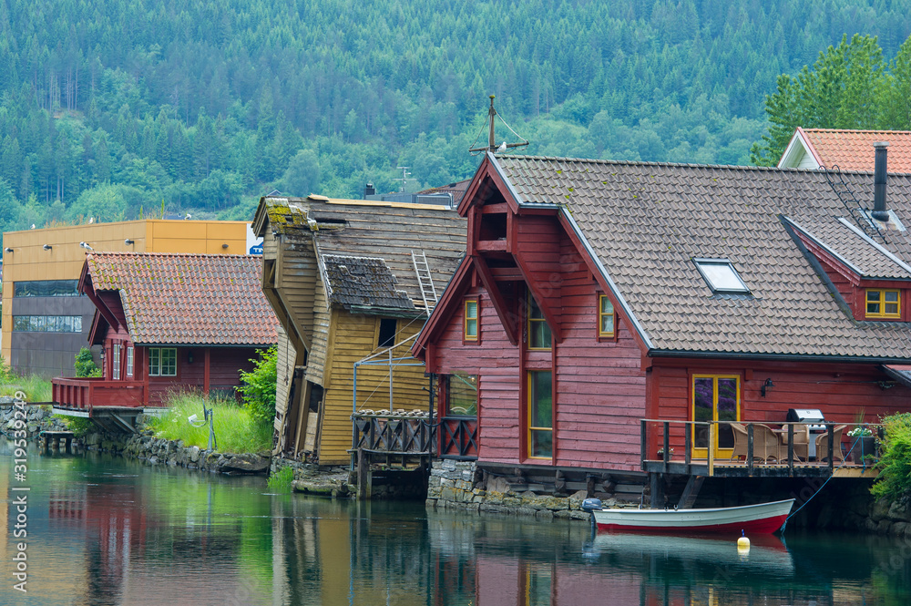 Typical Norwegian wooden houses on the shores of the lake that bathes Stryn Norway