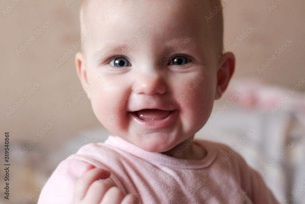portrait of a little girl who makes faces and smiles portrait of a little girl who makes faces and smiles