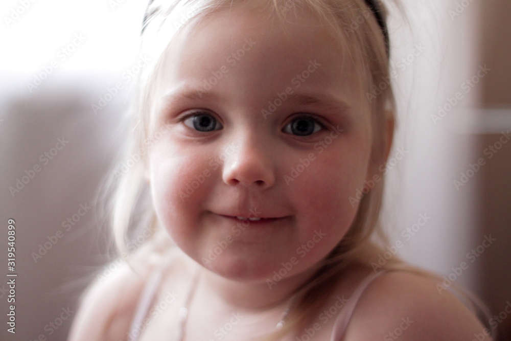 portrait of a smiling little girl portrait of a smiling little girl