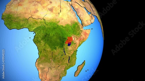 Closing in on Uganda on political 3D globe with topography. 3D illustration.