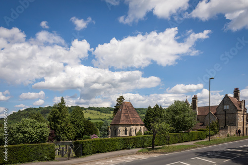 A nice sunny day view of Box Hill from Dorking, looking across the graveyard to the hills in the background
