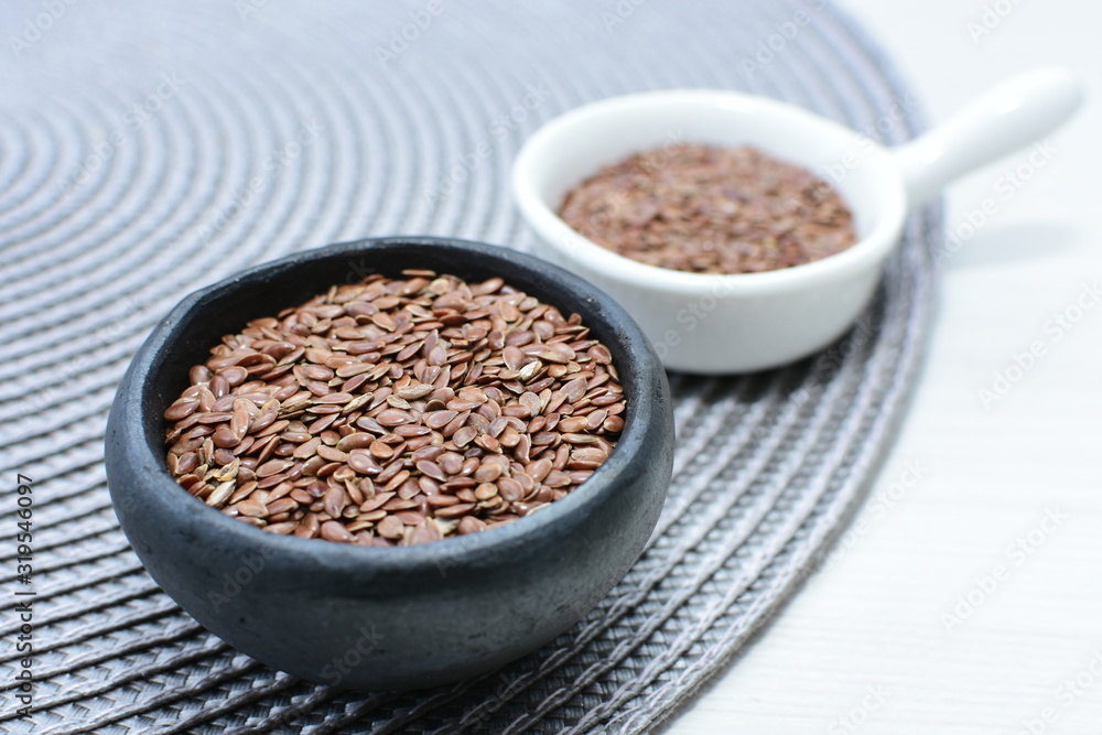 natural flaxseed seeds displayed in containers natural flaxseed seeds displayed in containers