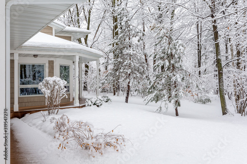 Home in Snowy Woods in Winter © james_pintar