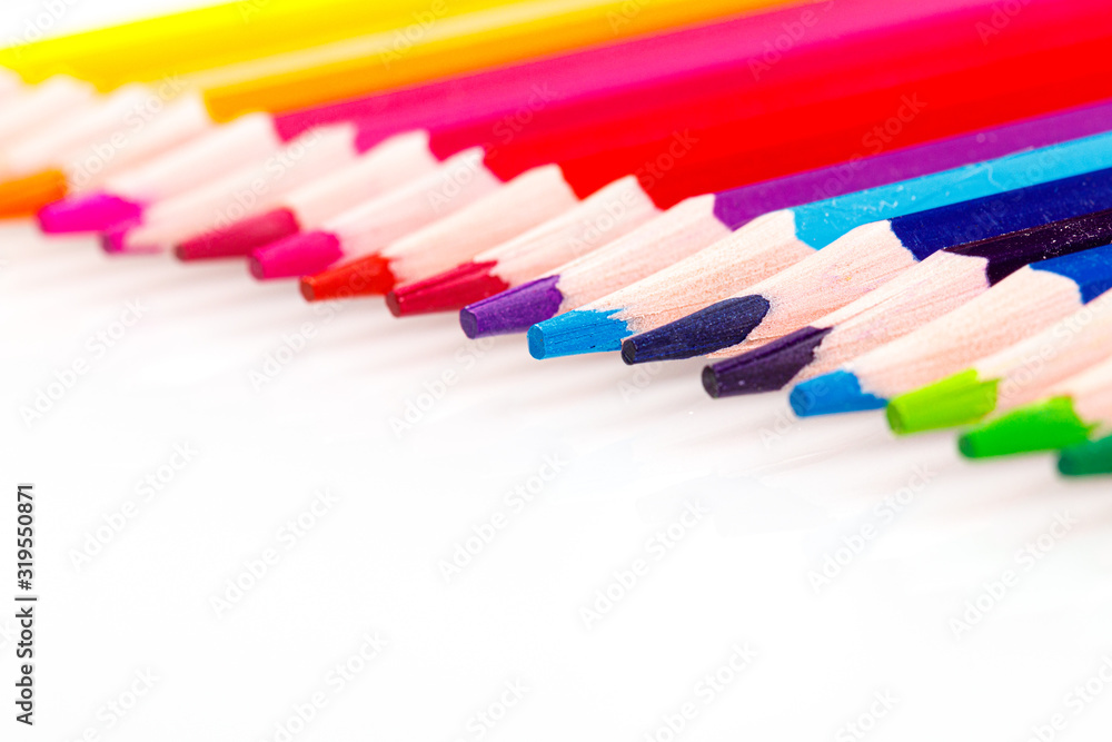 macro multicolored pencils on a white background macro multicolored pencils on a white background