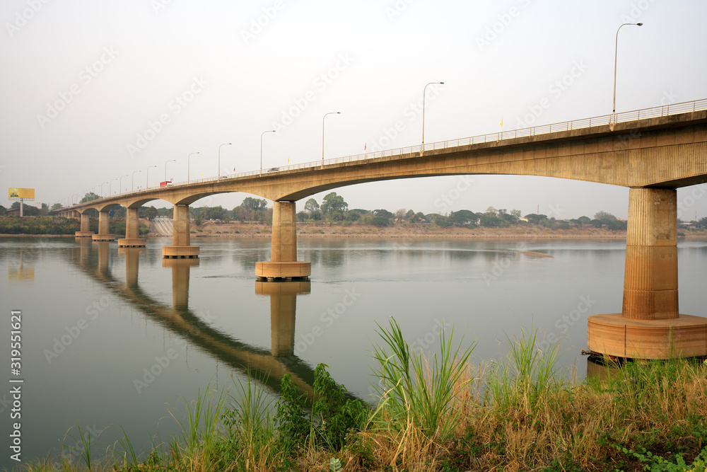 Udon Thani,Thailand-January 23, 2020: First Thai–Lao Friendship Bridge viewed from Nong Khai, Thailand Udon Thani,Thailand-January 23, 2020: First Thai–Lao Friendship Bridge viewed from Nong Khai, Thailand