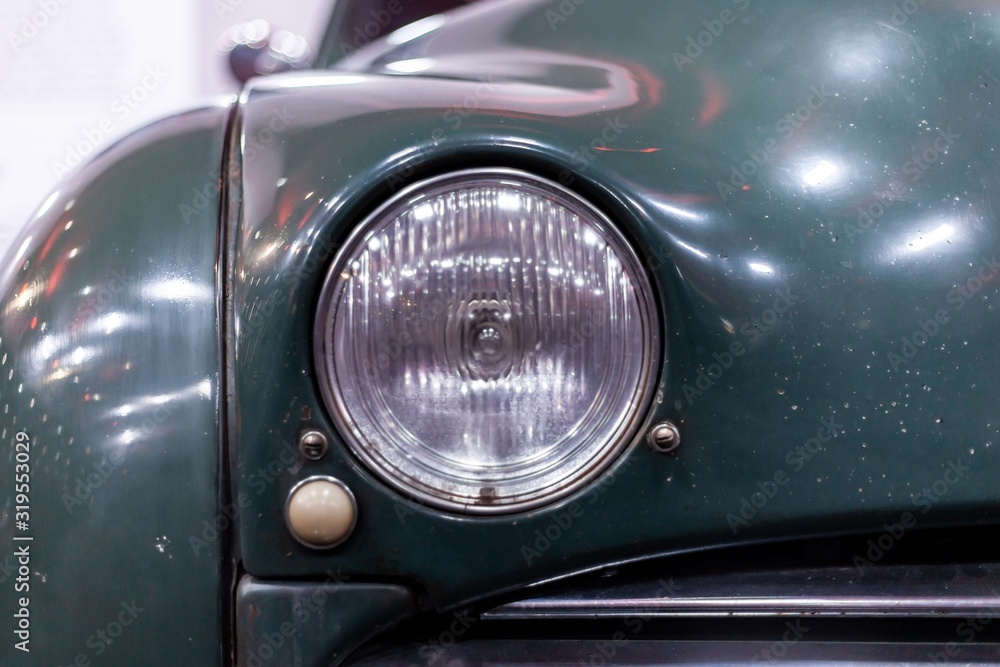 quirky interesting headlights on front of classic car