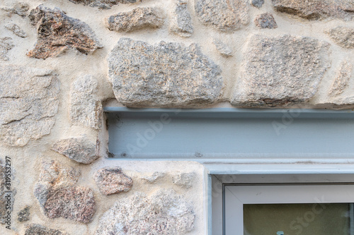 Detail of iron beam acting as window lintel. Rehabilitation of old buildings with present materials
