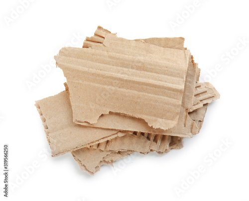 Pieces of torn cardboard isolated on white, top view