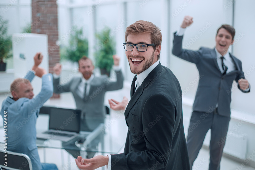 close up. smiling happy businessman looking at the camera close up. smiling happy businessman looking at the camera