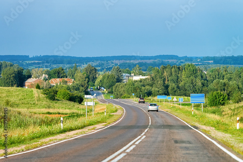 Scenery with car on the road in Poland