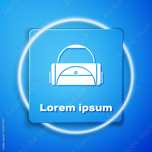 White Sport bag icon isolated on blue background. Blue square button. Vector Illustration