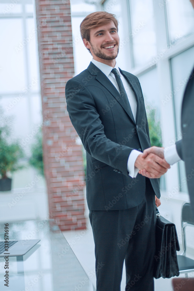 businessman meeting his business partner in the office businessman meeting his business partner in the office