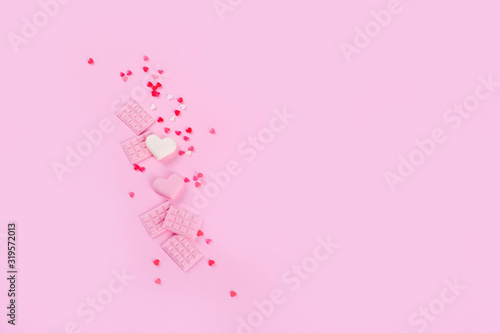 Concept for the holiday of All lovers  a place for writing  a view from above. Hearts  gentle background  gift